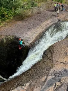 Two hoisted to safety after waterfall accident